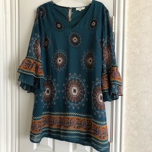 Turquoise patterned boho tunic top by Umgee